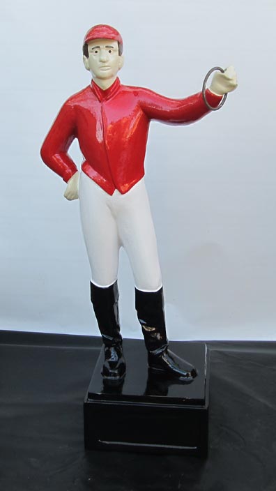 red lawn jockey white face jockey statue 