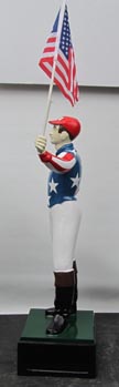 wrought aluminum lawn jockey Lawn jockey holding US flag American patriotic red white and blue painted jockey 
